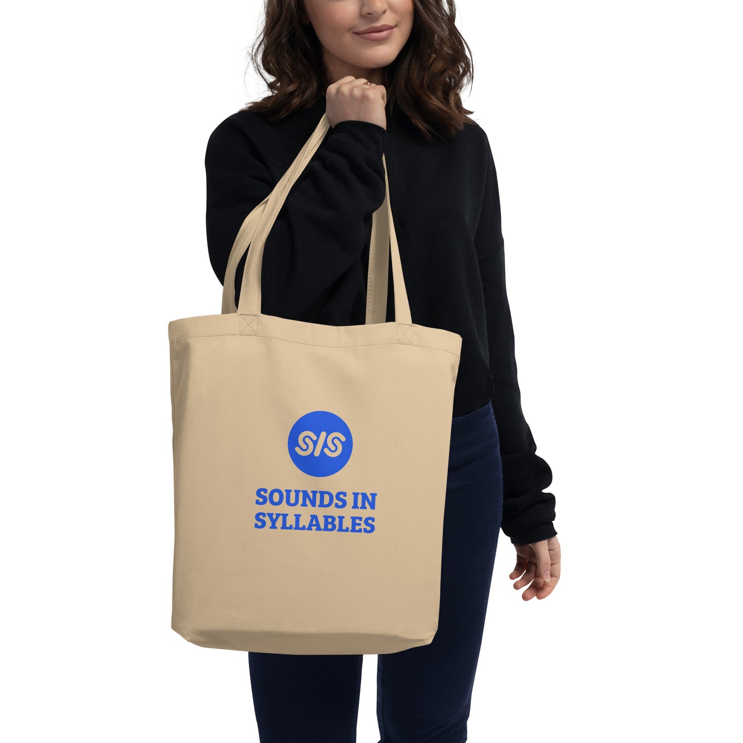 lady holding SIS tote bag 